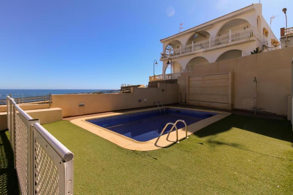 Apartment Aticos Primera Linea Con Piscina By Rent Me